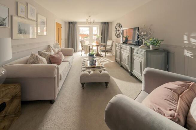 a living room with a couch and a tv