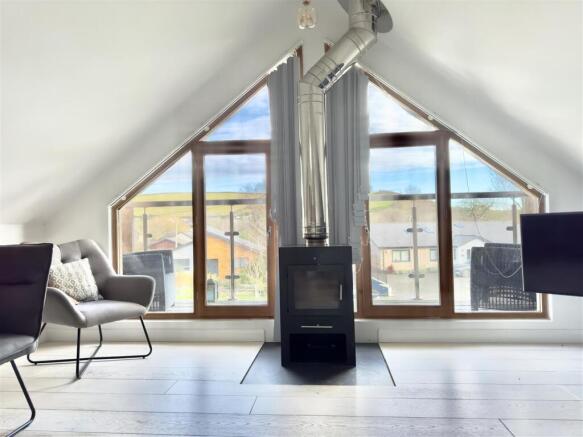 Log burner with valley view