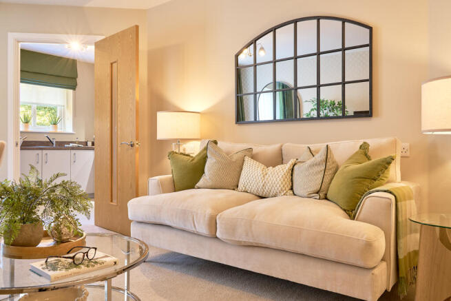 a living room with a couch and a table