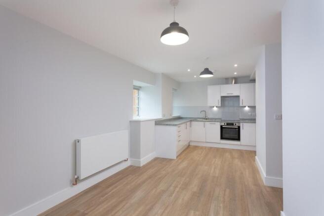 Open plan kitchen dining living area