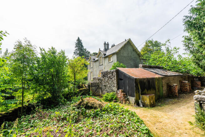 Outhouses to Rear