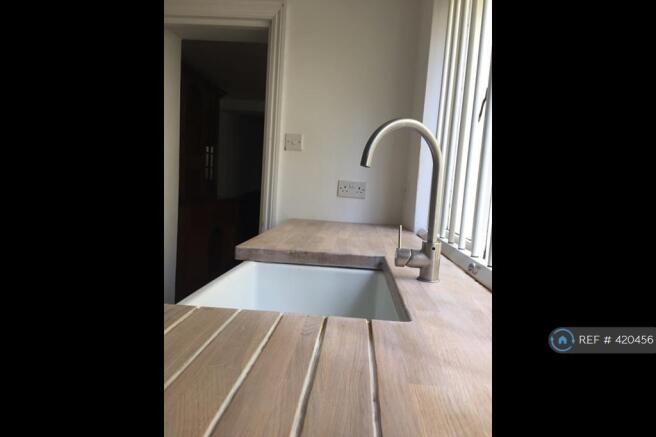 Kitchen With Butler Sink And Free Stainding Unit