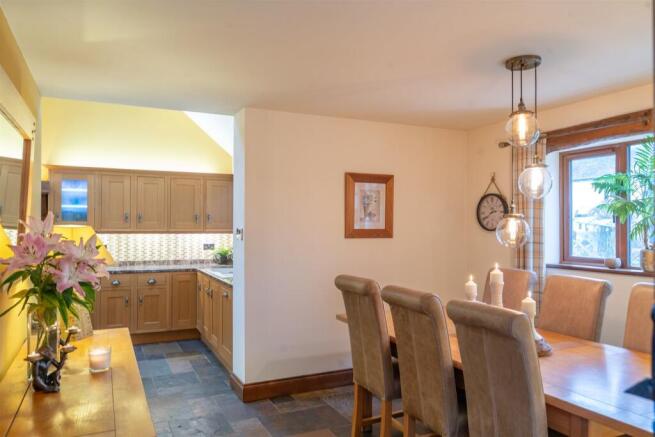 The Dining Room Opens Out To The Stunning Kitchen