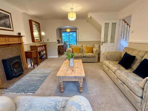 Large square sitting room, log burner