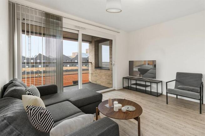 Step into elegance with this chic urban living room, perfect for relaxation and entertaining.