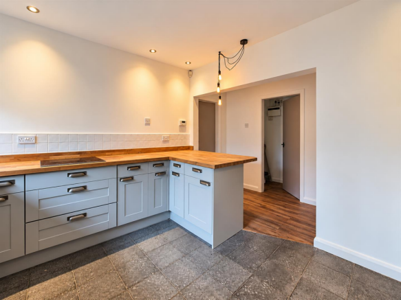 Modern Kitchen with Warm Wood Accents.png
