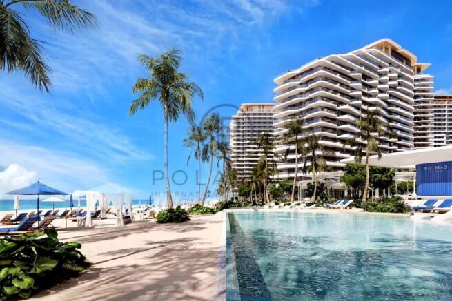 A luxurious beachfront resort with modern high-ris