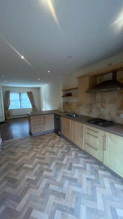 kitchen looking o...