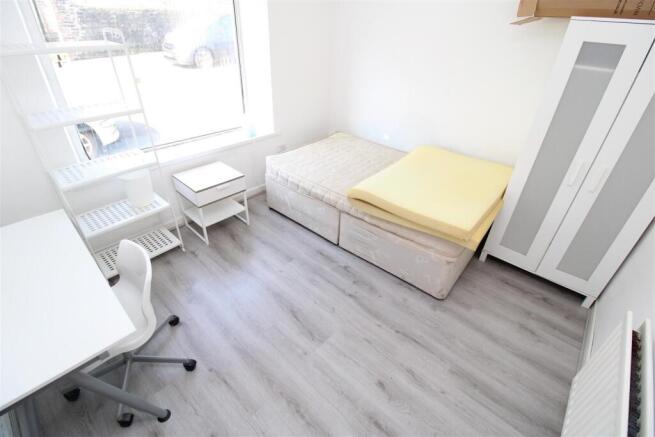 Bright modern bedroom with ample study space...