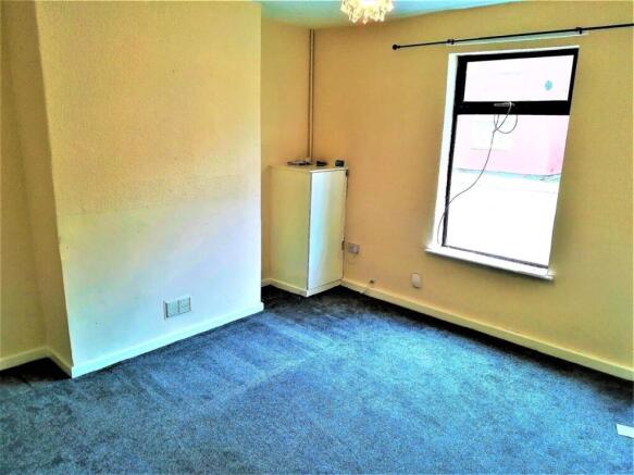 Bright room with soft carpet and window light...