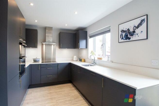 Stylish kitchen with stone worktops