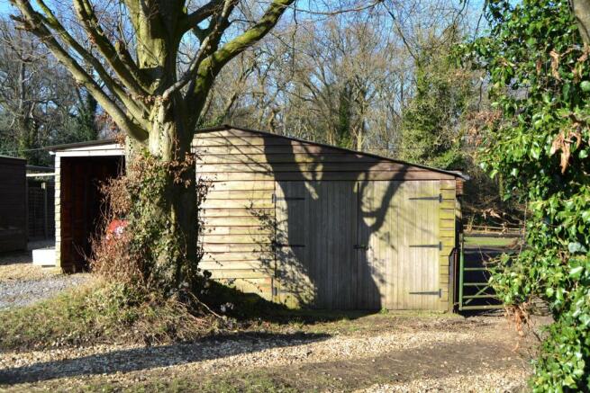 Timber garage and ca