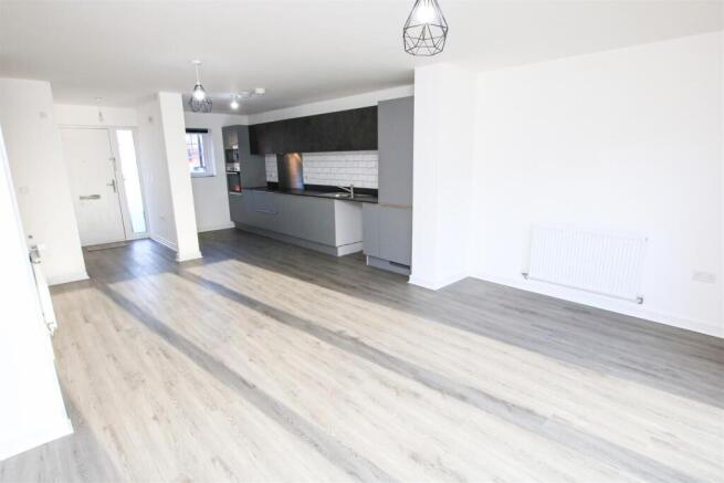 LIVING/ DINING/ KITCHEN AREA