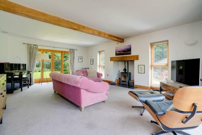 Gorgeous sitting room with log burner