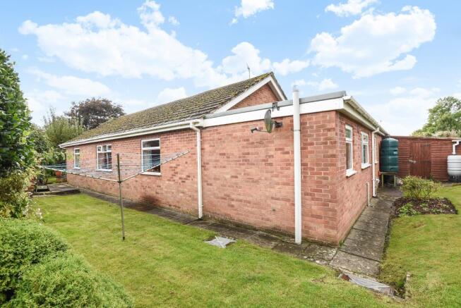 Gardens extend all round the bungalow