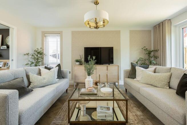There's room for the whole family to relax in the light & spacious living room