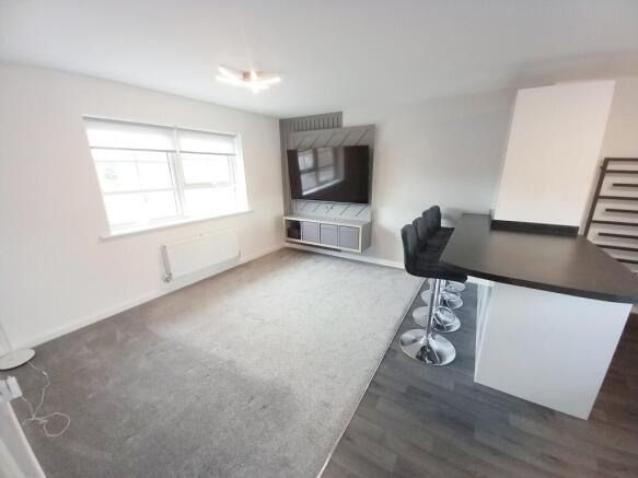 OPEN PLAN LOUNGE AND KITCHEN