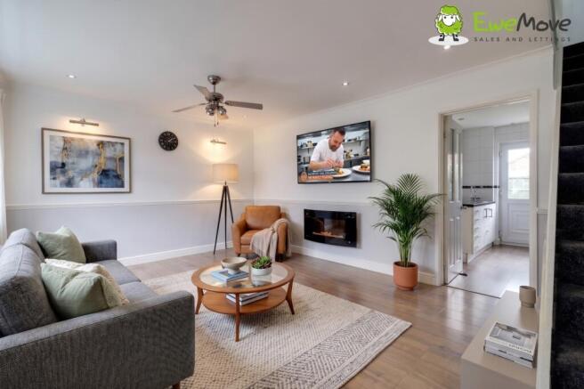 Lounge (virtually staged) at Seaford Close by Benn