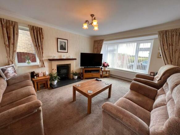Lounge open plan to Dining Room