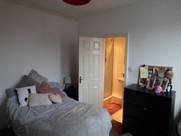 A cozy and inviting living room with natural li...