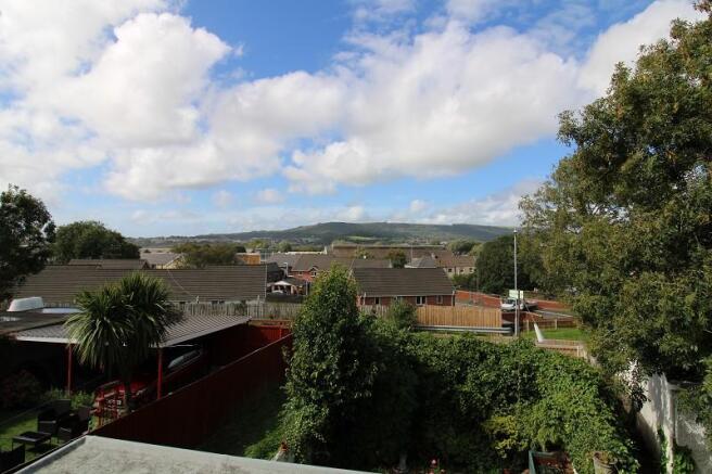 VIEW OF GARDEN FROM BEDROOM