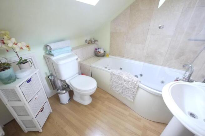 FAMILY BATHROOM:-