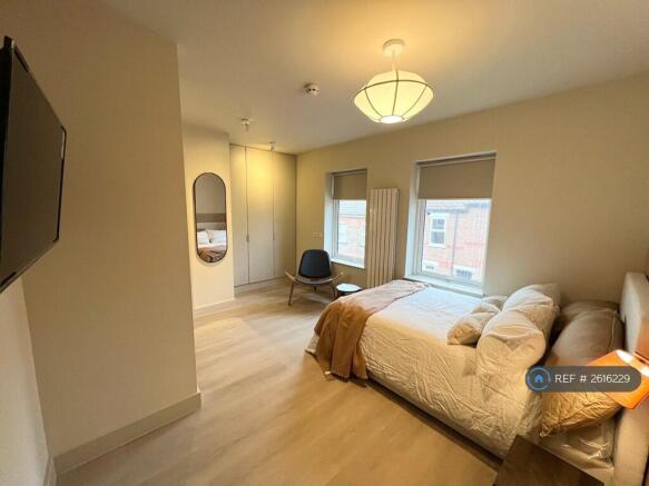 Spacious Wardrobe With Storage Under-Bed