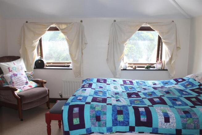 BEDROOM 1 (REAR)