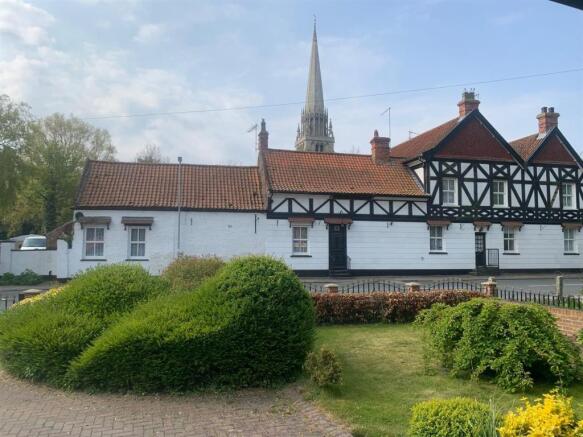 Front of House 7 with Church View.jpg