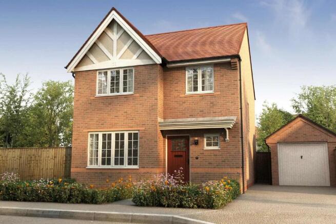 A two-story brick house with a gabled roof