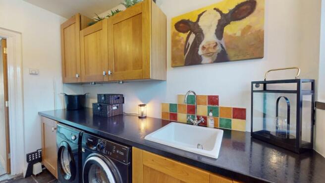 RECEPTION HALL/UTILITY ROOM
