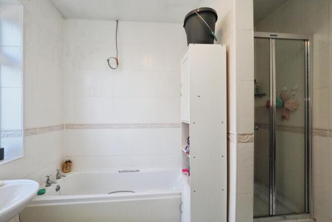 Family bathroom with separate shower