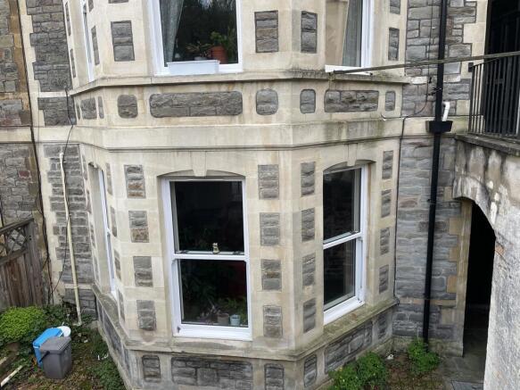 Stunning traditional stone facade with bay wind...