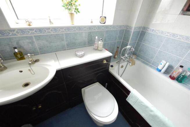 TILED BATHROOM:-