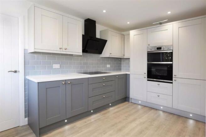 KITCHEN OPEN TO FAMILY/GARDEN ROOM