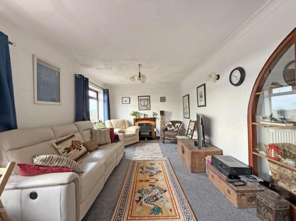 Combley Drive 9 - Living Room Front.jpg