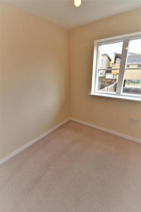 Bedroom 3 With Fitted Wardrobe & Window To Rear