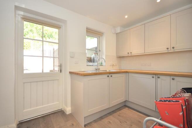 Utility / boot room with rear access