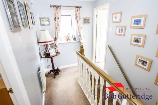 FIRST FLOOR LANDING