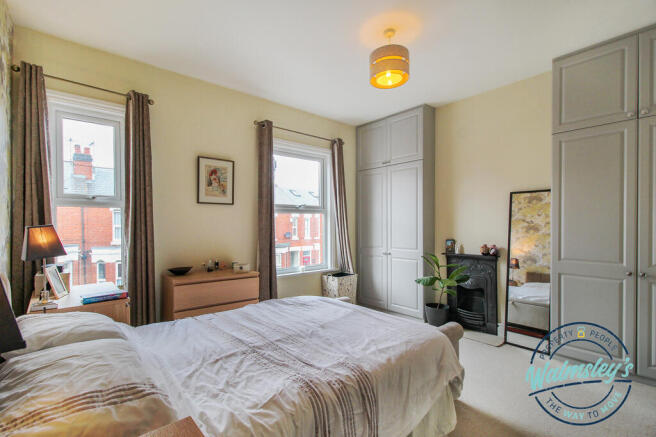 Bedroom one with fitted wardrobes