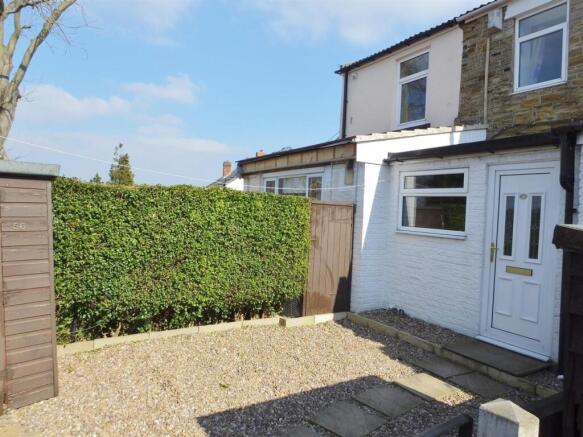 Bright, low-maintenance gravelled garden area....