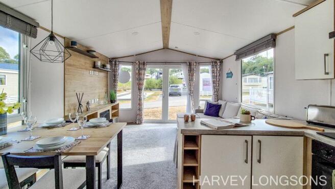 Open-plan lounge, dining and kitchen area.