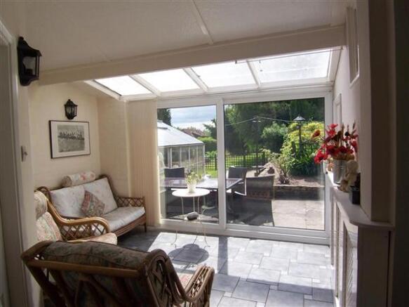 SUN ROOM AND HALLWAY