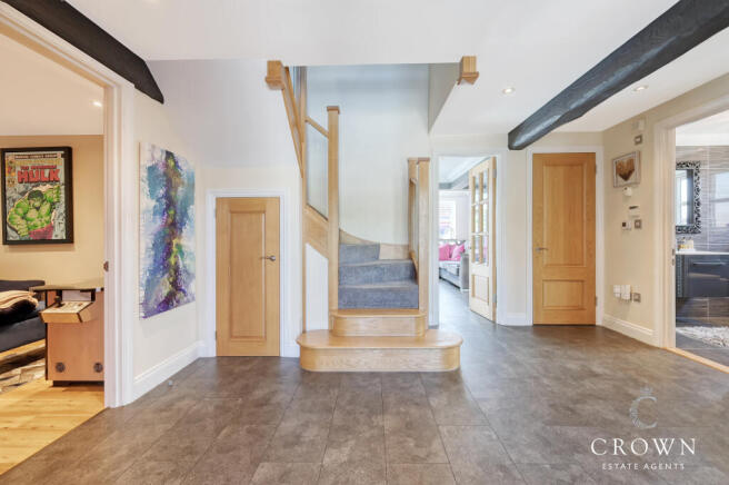 Hallway with Contemporary  Glass Staircase