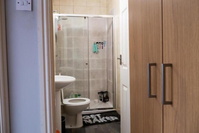 A clean and well-maintained bathroom with a toi...