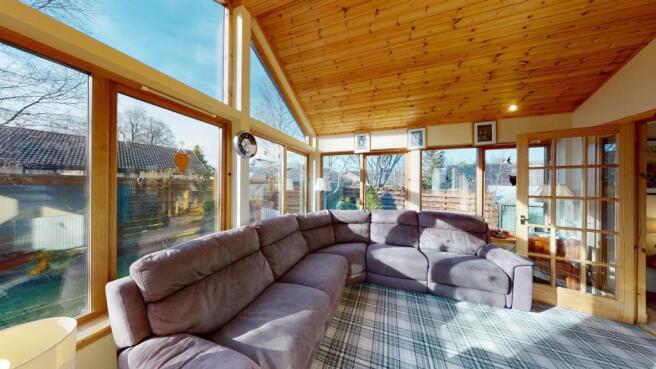 Crannog-Drumuille-Road-sun-room.jpg
