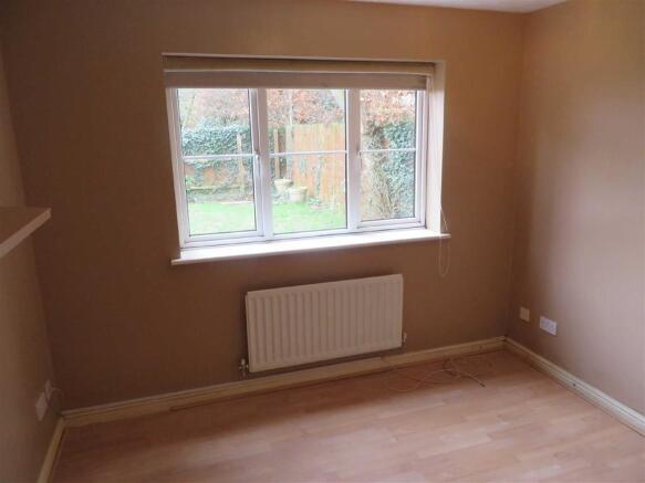 BEDROOM 1 (REAR)