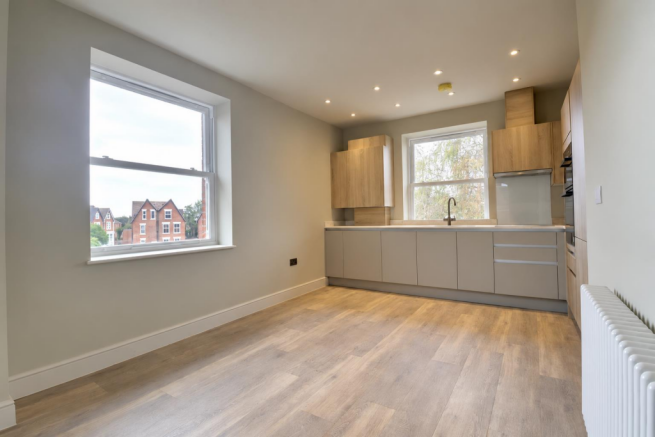 Minimalist Kitchen with Hidden Appliances.png