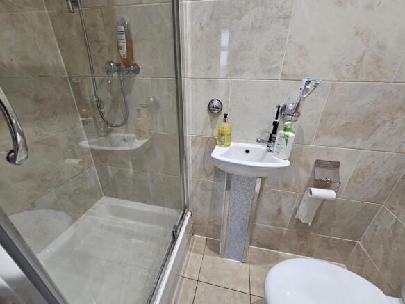 A clean and well-maintained bathroom featuring ...