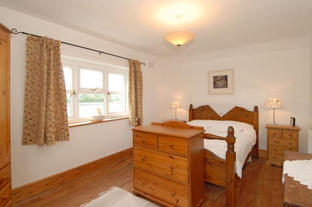 Master bedroom with exposed boards